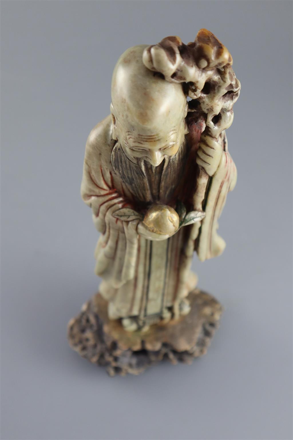 A Chinese soapstone figure of Shou Lao, 18th century, 28.5cm high
